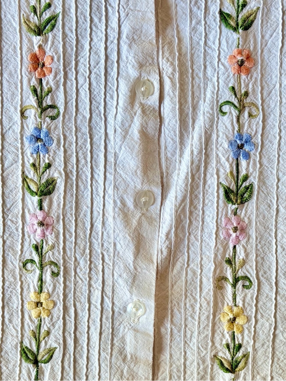 White Sleeveless Button-Front Knit Top with Floral Embroidery